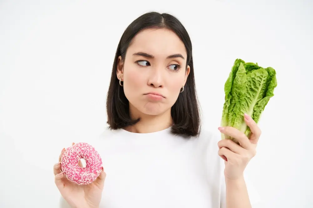 healthy-lifestyle-concept-young-woman-deciding-healthy-vegetables-cabbage-delicious-glaz (1)